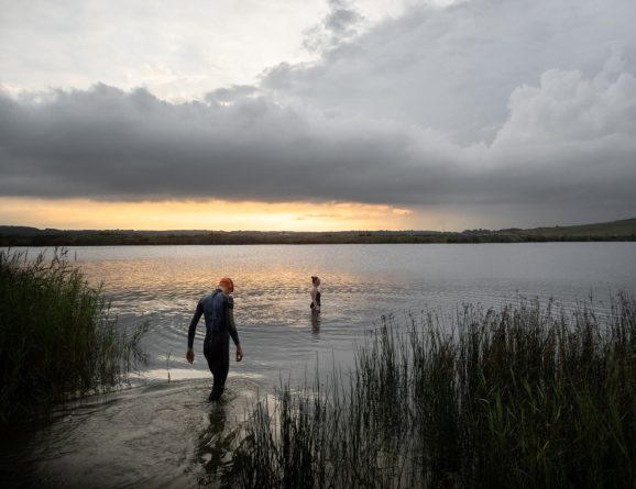 swimmers sunset lake