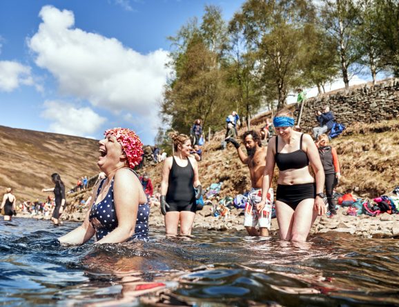 swimmers laughing and getting in water at Kinder reservoir 2022