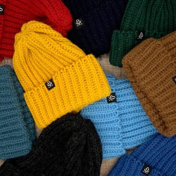 selection of beanie hats in different colours