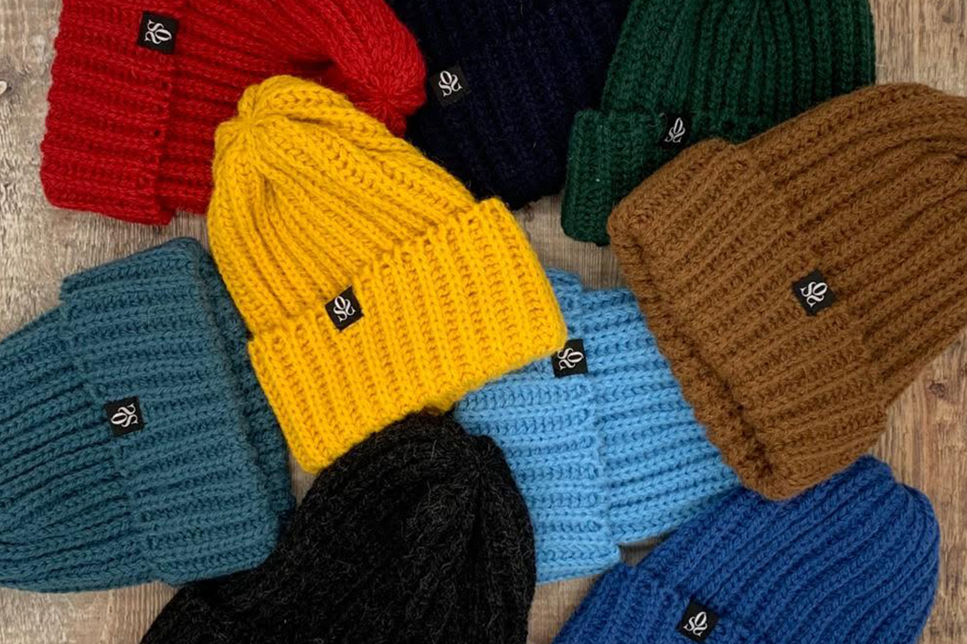 selection of beanie hats in different colours