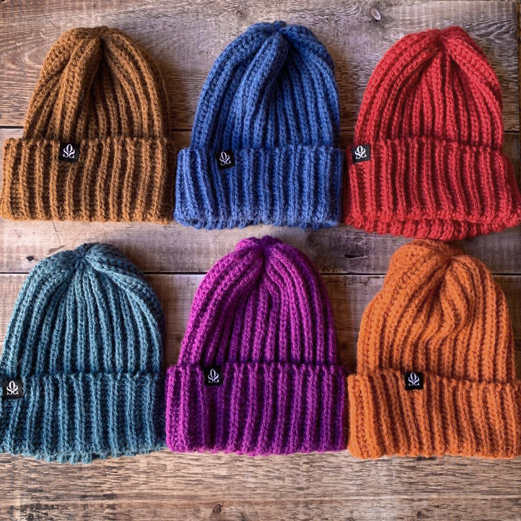 selection of beanies in different colours