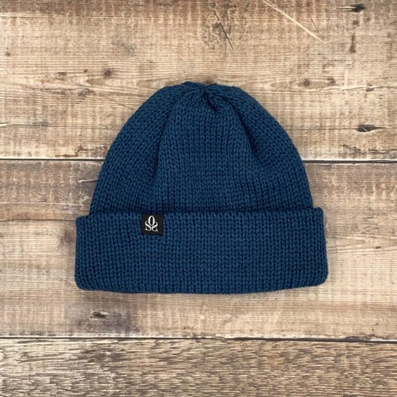 blue watch cap beanie with oss tag