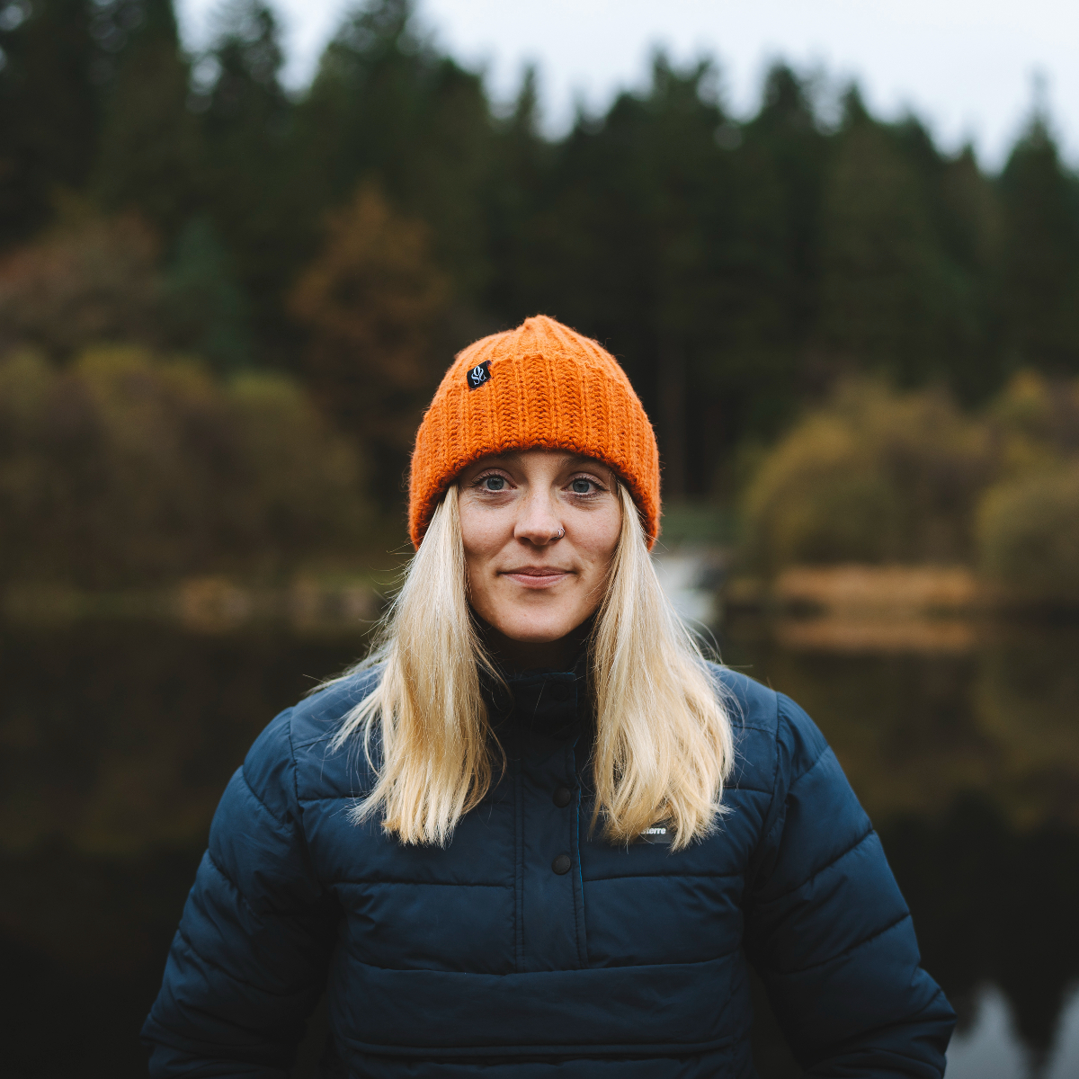 Orange (Hollie Harmsworth) woman in orange beanie